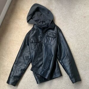This is a leather jacket with a hoodie for kids